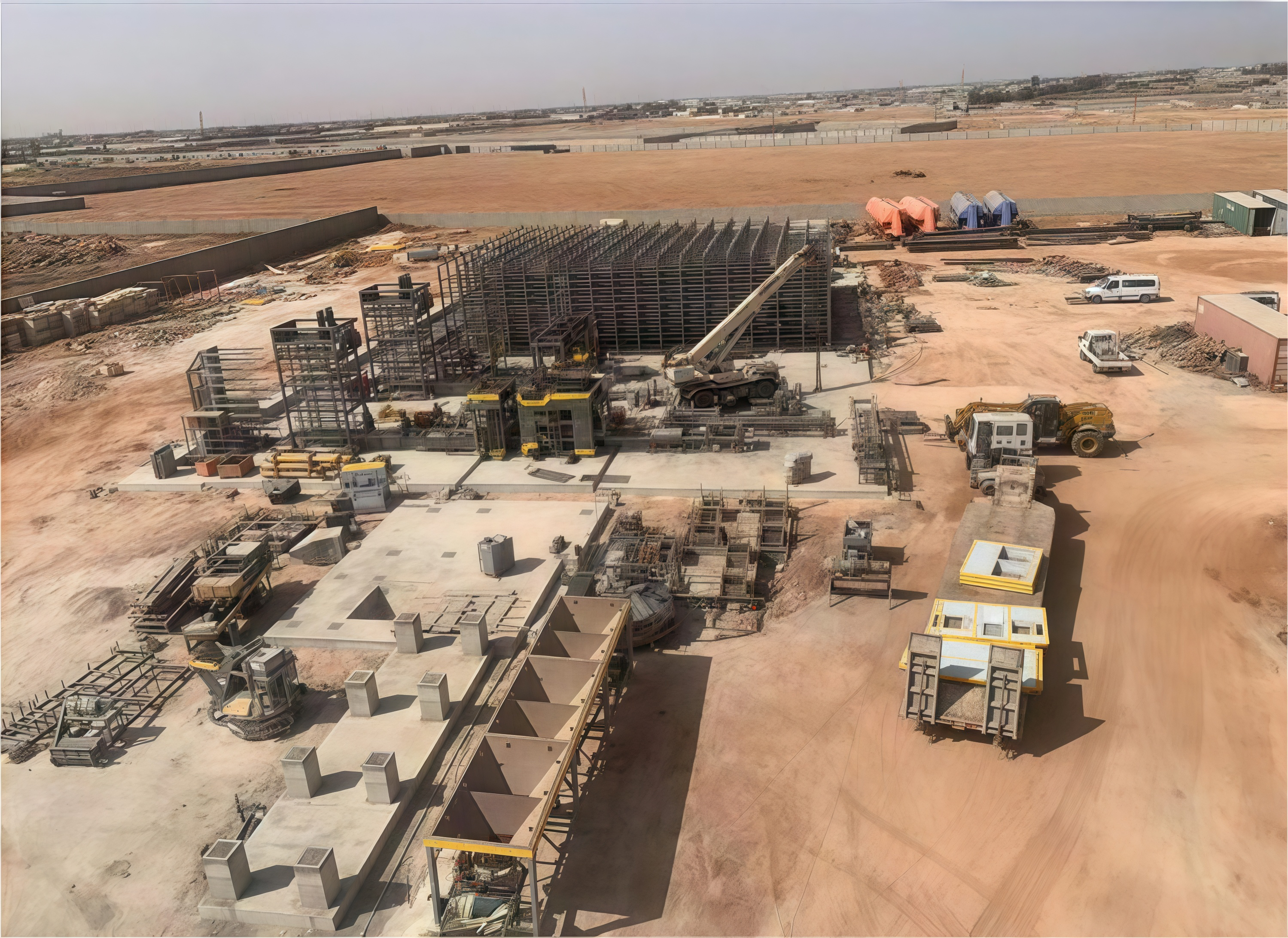 Qunfeng Machinery QS2000—a large-scale, fully automated concrete product production line commissioned in Libya. কুনফেং মেশিনারি QS2000—একটি বৃহৎ আকারের, সম্পূর্ণ স্বয়ংক্রিয় কংক্রিট পণ্য উৎপাদন লাইন লিবিয়াতে চালু করা হয়েছে।